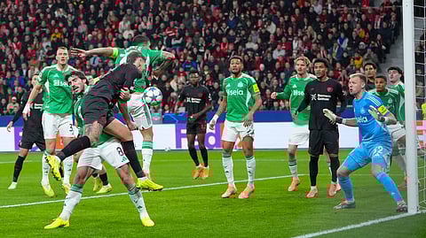Bayer Leverkusen's Robert Andrich heads the ball to score the opening goal during the UEFA Champions League league phase - matchday 6, football match between Bayer Leverkusen and Newcastle United FC on December 10, 2025.