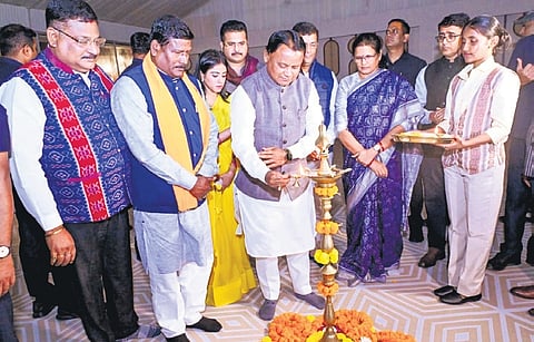 CM Mohan Charan Majhi lighting the ceremonial lamp at the inaugural event of the 7th eco-retreat at Ramchandi, on Friday