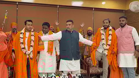 BJP leader and West Bengal LoP Suvendu Adhikari felicitates three men arrested for allegedly assaulting vendors at the 'Gita Paath' event in Kolkata.