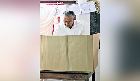 Chief Minister Pinarayi Vijayan casting vote at booth number one at Cherikkal Junior Basic School in Pinarayi grama panchayat.
