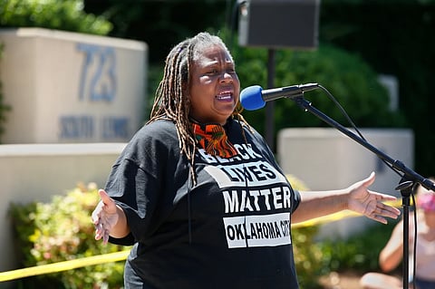The Rev. T. Sheri Dickerson, a co-founder of Black Lives Matter in Oklahoma City, speaks during a rally outside the Stillwater Police Department in Stillwater, Okla., June 3, 2020, to protest the death of George Floyd, a black man who died after being restrained by Minneapolis police officers on May 25.