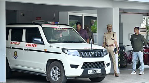Photo attached: The SIT and team of police officials from Palakkad at the apartment of Rahul Mamkootathil MLA at Kunnathurmedu on November 30