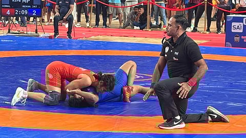 A wrestling bout in progress during the Senior National Championships in Ahmedabad on Friday