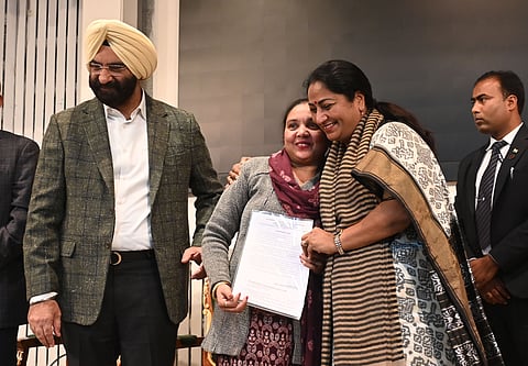 CM Rekha Gupta and Cabinet Minister Manjinder Singh Sirsa hand over appointment letters to the eligible candidates at the Secretariat on Friday.