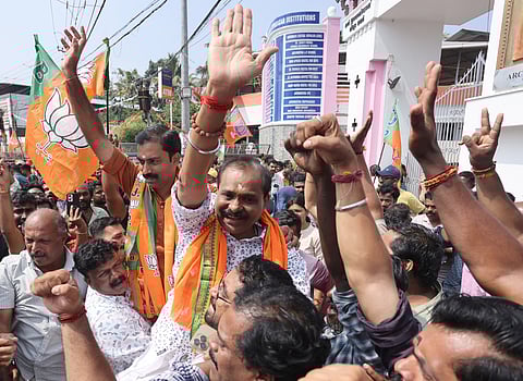 Winning NDA candidates in Thiruvananthapuram Corporation, VG Girikumar and VV Rajesh, celebrate their victory.