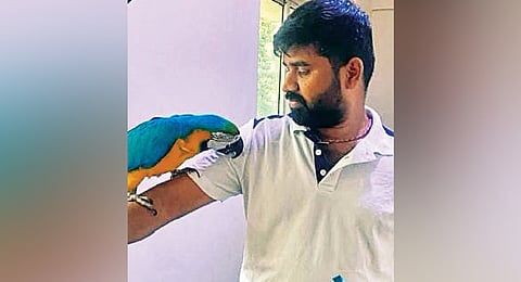 Arun Kumar, with the macaw
