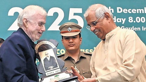 Governor Rajendra Arlekar hands over the Justice V R Krishna Iyer Award to former Chief Justice of India and former Kerala Governor Justice P Sathasivam