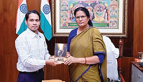 Odisha Deputy CM Pravati Parida unveiling Rakesh Panda's short story collection.