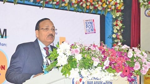 CJI Surya Kant speaking at the symposium.