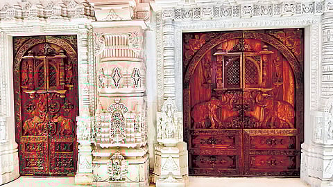 A front view of the door crafted and installed by Hyderabad-based Anuradha Timber International for the Ram temple in Ayodhya.