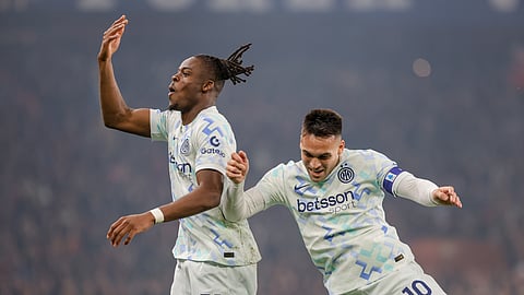 Inter's Yann-Aurel Bisseck celebrates after scoring a goal during the Serie A soccer match between Genoa and Inter, in Genoa, Italy, Sunday, Dec. 14, 2025.