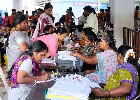 BLO officers seen attending public at a help desk on SIR at everwin school at kolathur in chennai