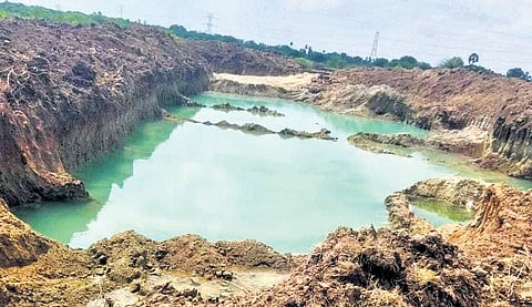 Farmers have been protesting against the alleged illegal removal of soil from Malappambadi lake.