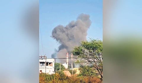 A thick plume of smoke billows from the MS Agarwal Steel Industry in Manoharabad mandal on Monday