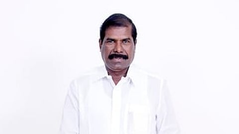 G K Mani.