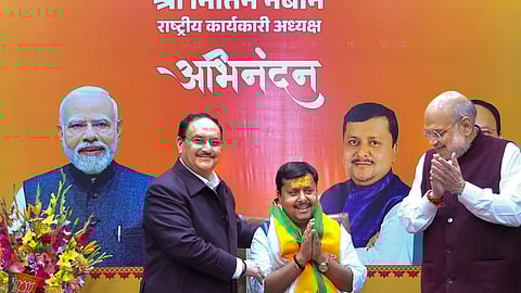 Union Ministers Amit Shah and JP Nadda congratulate newly appointed BJP National Working President Nitin Nabin during a ceremony, in New Delhi.
