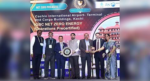 CIAL managing director S Suhas and airport director Manu G receiving the award at the 23rd Green Building Congress in Mumbai.