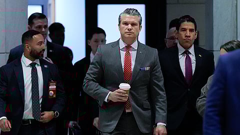 US Defense Secretary Pete Hegseth arrives to brief members of Congress on military strikes near Venezuela, Tuesday, Dec. 16, 2025, at the Capitol in Washington.