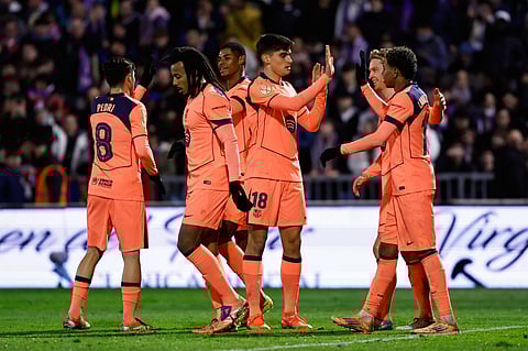 Barcelona's Marcus Rashford, third left, celebrates after scoring his side's second goal with his teammates during the Copa del Rey soccer match between Guadalajara and Barcelona in Guadalajara on Dec. 16, 2025.