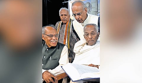 Litterateurs Nadoja Dr Go Ru Channabasappa, N Someshwara and others during the release of Kannada Shabdartha Kosha.