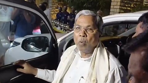 Karnataka CM Siddaramiah arrives to meet other Congress legislators at a dinner hosted by senior Minister Satish Jarkiholi in Belagavi on Thursday, Dec. 18, 2025.