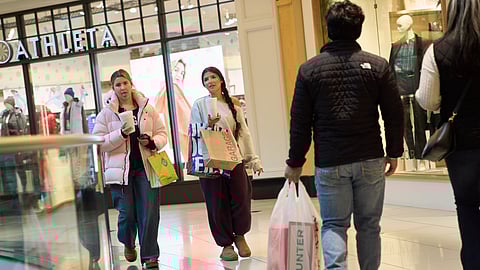 Shoppers walk around the Somerset Collection mall on Wednesday, Dec. 10, 2025, in Troy, Mich.