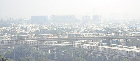 A layer of fog engulfs the city on Saturday