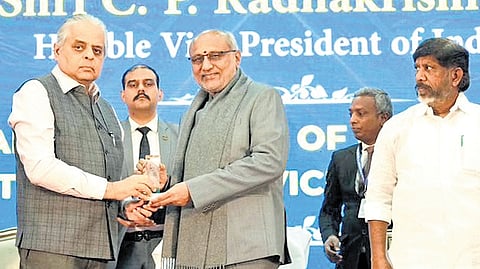 Vice-President CP Radhakrishnan receives a memento during the valedictory session of National Conference of Chairpersons of PSCs on Saturday