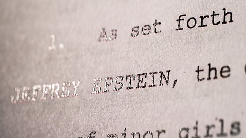 The files included only a small number of photos of Trump, and the Justice Department acknowledged that its document disclosure was incomplete.