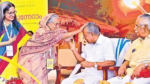 Actor Nilambur Ayisha sharing a light moment with Chief Minister Pinarayi Vijayan during the inaugural ceremony of Indian Cultural Congress at Rajendra Maidan in Kochi on Saturday. Writer T Padmanabhan is also seen.
