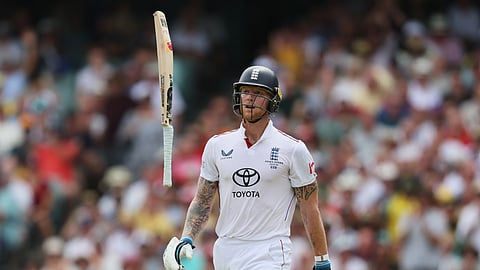 England's Ben Stokes throws his bat as he reacts after he was bowled out during play on day three of the third Ashes cricket test between England and Australia in Adelaide, Australia, Friday, Dec. 19, 2025.