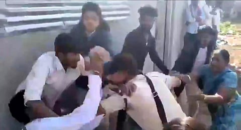 Chinnabuggaram defeated sarpanch family members attack on the police in Neeradigonda mandal in the district.