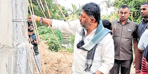 DCM DK Shivakumar inspects Sachara Yukta Project work in Bengaluru on Monday.