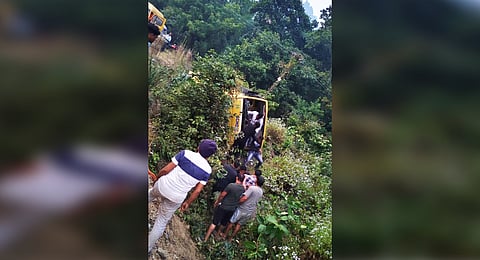 Injured passengers being rescued from the ill-fated bus.
