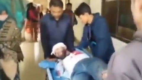 Senior leader of Bangladesh’s student-led National Citizen Party , Muhammad Md Motaleb Sikder, being brought to hospital after he was shot in his head.