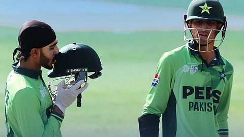 Pakistan opener Minhas (L) struck a brilliant century as Pakistan motored to a humongous total.