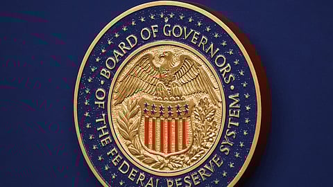 The Federal Reserve Chair logo appears on a podium at the Federal Reserve, Wednesday, Dec. 10, 2025, in Washington.