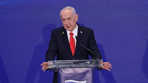 Israeli Prime Minister Benjamin Netanyahu speaks during a joint press conference after a trilateral meeting with Cyprus President Nikos Christodoulides and Greek Prime Minister Kyriakos Mitsotakis at the Citadel of David Hotel in Jerusalem, Monday Dec. 22, 2025.