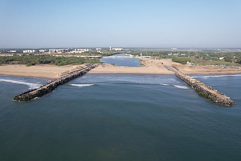 Work on the construction of river training walls and infrastructural improvement of the fish landing centre at Chandirapadi village in Tharangambadi taluk of Mayiladuthura.