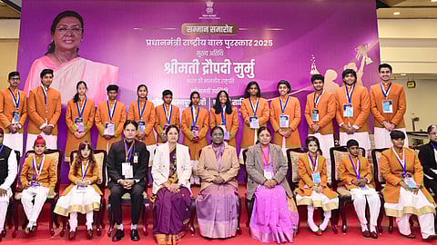 In this image posted on Dec. 26, 2025, President Droupadi Murmu with winners of the 'Pradhan Mantri Rashtriya Bal Puraskar' poses for a group picture during a ceremony on the occasion of 'Veer Bal Diwas', in New Delhi.