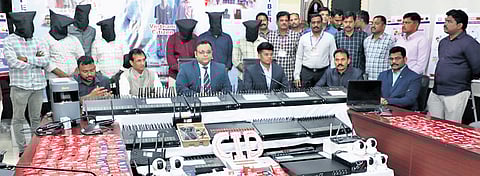 Cybercrime SP Adhiraj Singh Rana explains the modus operandi of international cybercrime network at a media conference in Vijayawada on Friday.