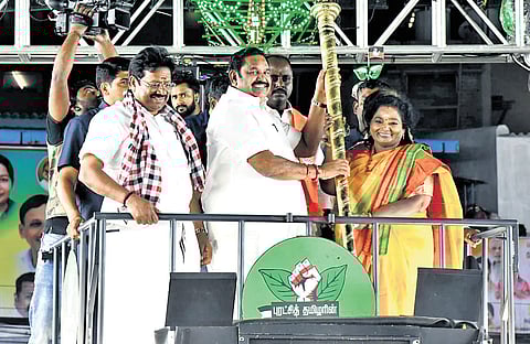 Former Telangana governor Tamilisai Soundararajan presented AIADMK chief K Palaniswami with a gold-plated sceptre at Sholinganallur on Sunday.