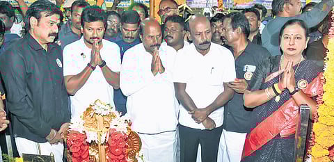 DyCM Udhayanidhi Stalin along with DMDK general secretary Premalatha Vijayakant and others paying respects at Vijayakant’s memorial on Sunday.