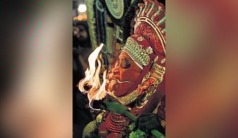 An artist portraying Chudala Bhadrakali