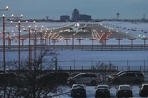 An American Airlines plane arrives at the O'Hare International Airport in Chicago, Sunday, Nov. 30, 2025.