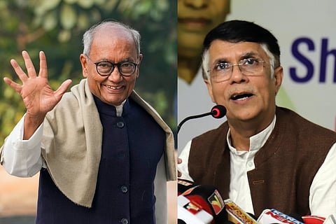 Congress leader Digvijaya Singh (L) and Chairman of the Media and Publicity Department of Congress, Pawan Khera