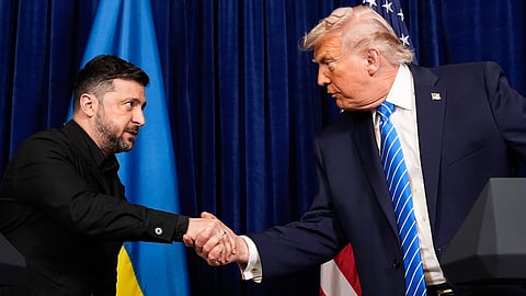 President Donald Trump and Ukraine's President Volodymyr Zelenskyy shake hands at the start of a joint news conference following a meeting at Trump's Mar-a-Lago club, Sunday, Dec. 28, 2025, in Palm Beach, Fla.