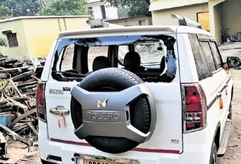 The vehicle of the Forest Department damaged in the attack.