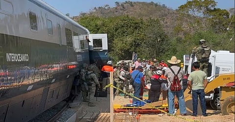 Mexican Army soldiers and Civil Protection members rescue passengers from the Interoceanic train that derailed in the Asuncion Ixtaltepec area on the route to Oaxaca, Mexico, on December 28, 2025.