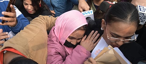 Survivor in the Unnao rape case leaves from Supreme Court, in New Delhi.